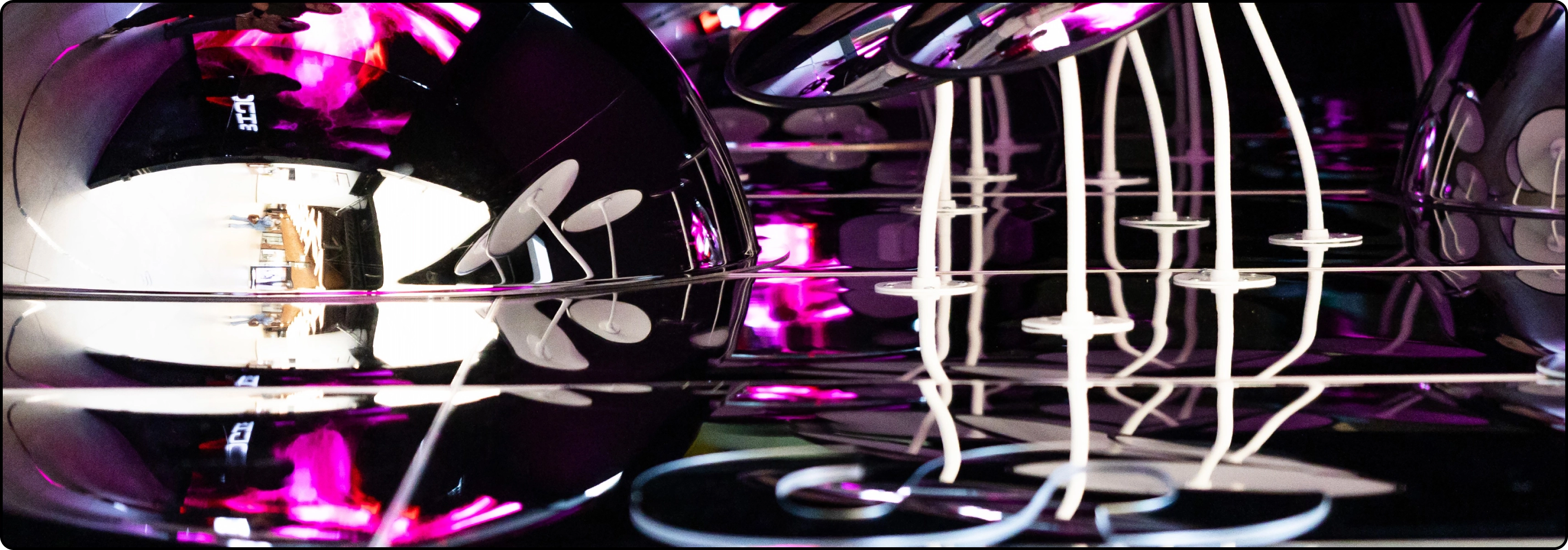 KTU Lifelong Learning page &ldquo;All Training&rdquo; banner &ndash; mirrored surfaces with purple reflections and light structural elements.